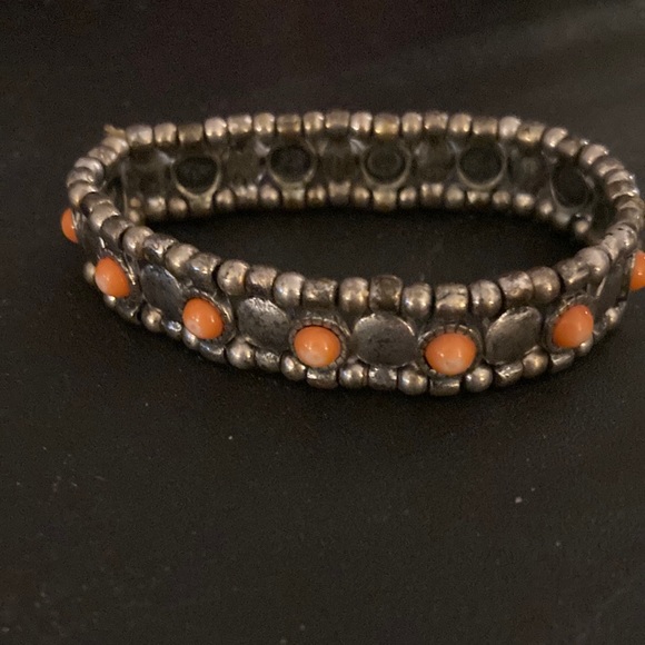 Jewelry - Silver toned bracelet with pink embellishments